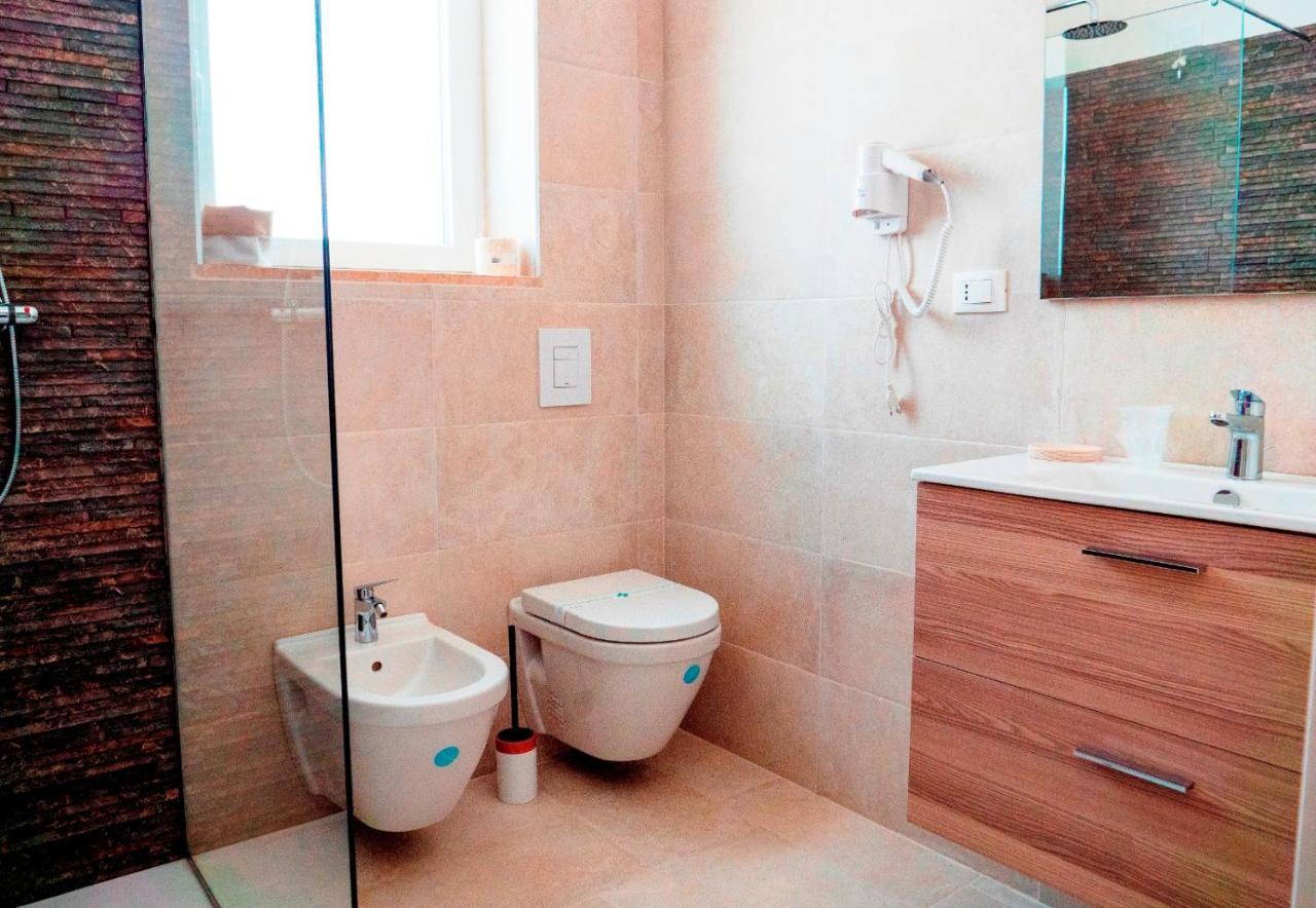 B&B A Un Passo Dal Mare ตอร์เรกันเน ภายนอก รูปภาพ